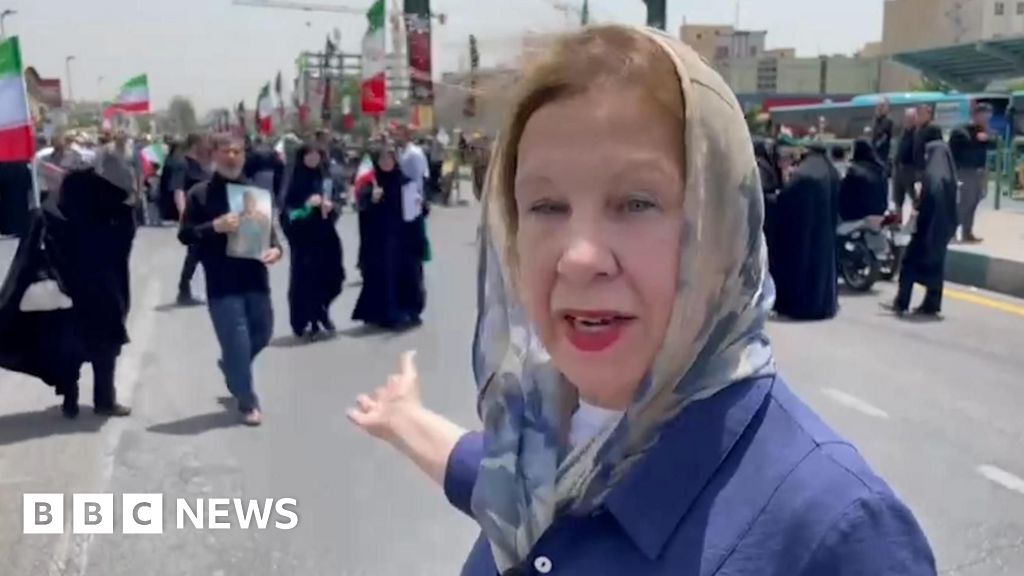 Anger and uncertainty in Iran as crowds mourn dead