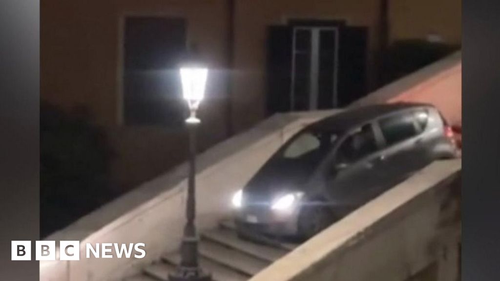 Watch: Man gets stuck driving car down Rome's Spanish Steps