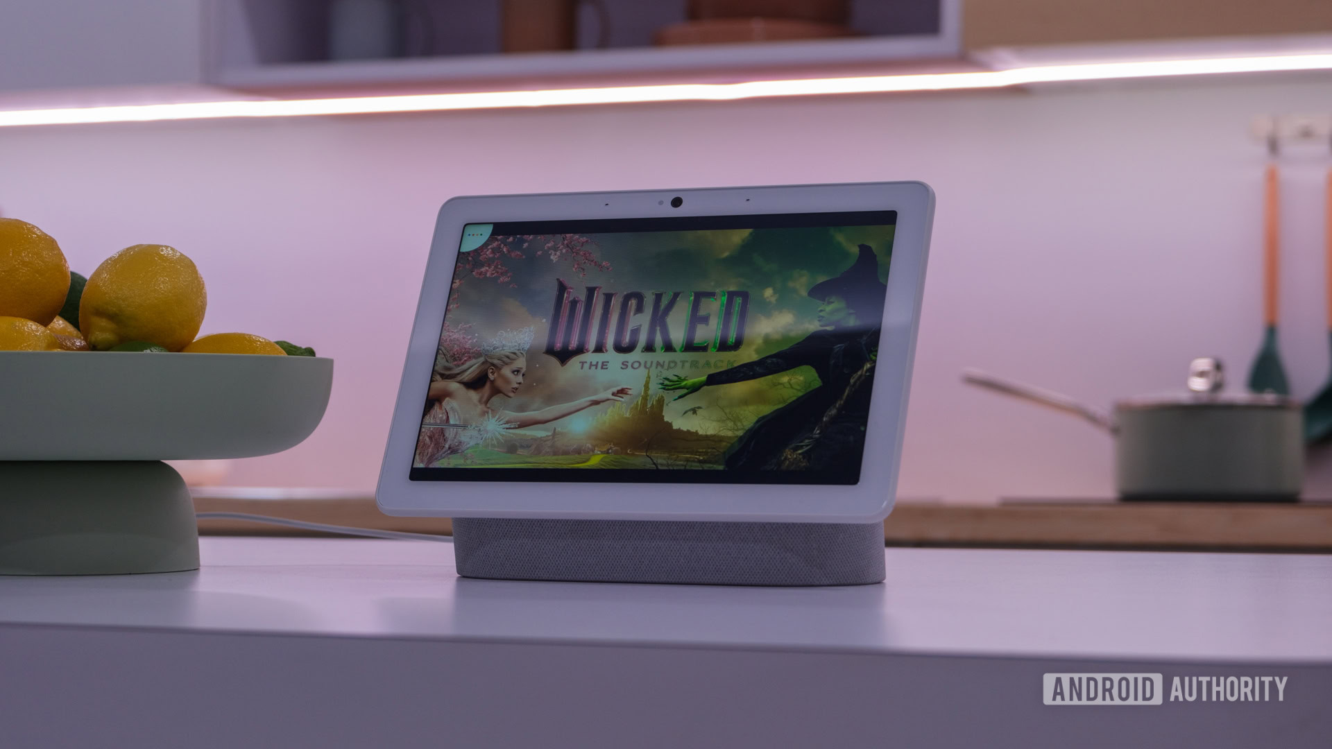 Google Nest Hub Max with Gemini models playing Wicked soundtrack