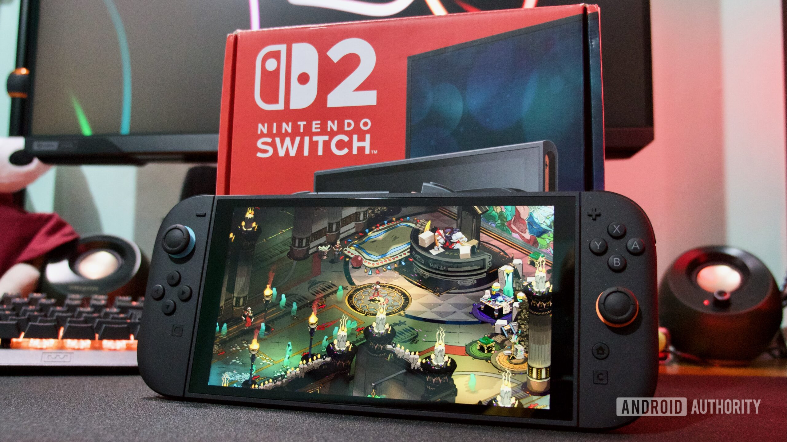 Nintendo Switch 2 in front of box hades