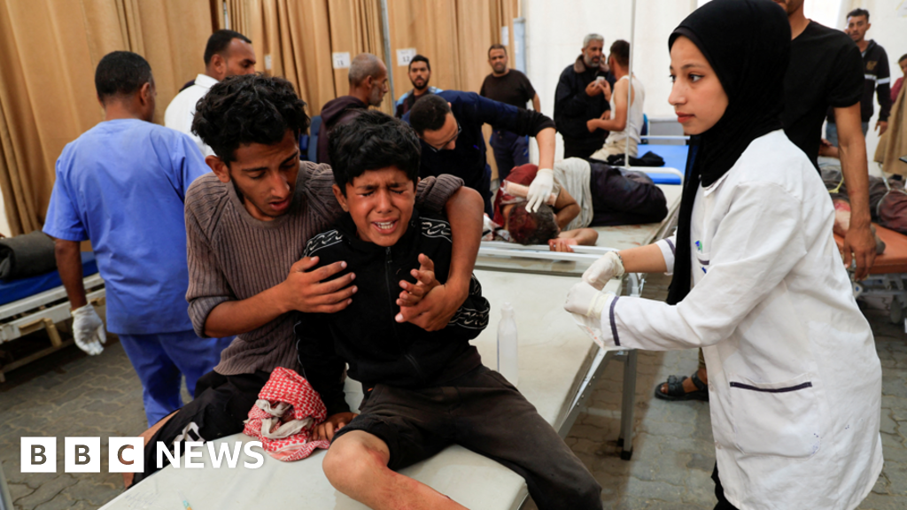 Israeli forces kill 51 Palestinians waiting for flour at Gaza aid site, witnesses and rescuers say