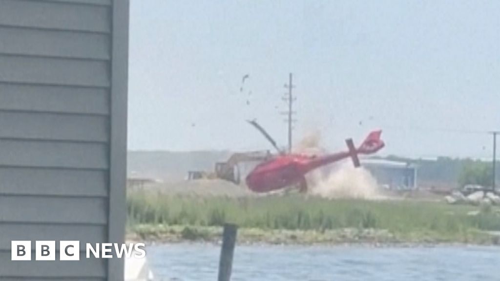 Watch: Helicopter flipped and crashed in Michigan