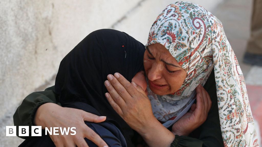 At least 12 Palestinians killed waiting for aid in Gaza, say medics