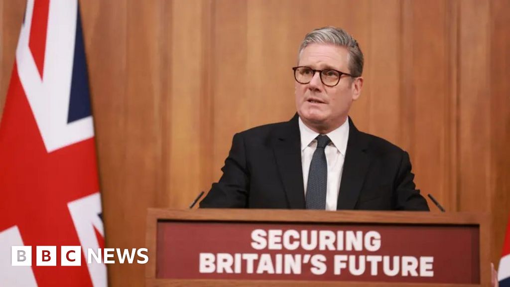 Starmer says he regrets using 'island of strangers' phrase