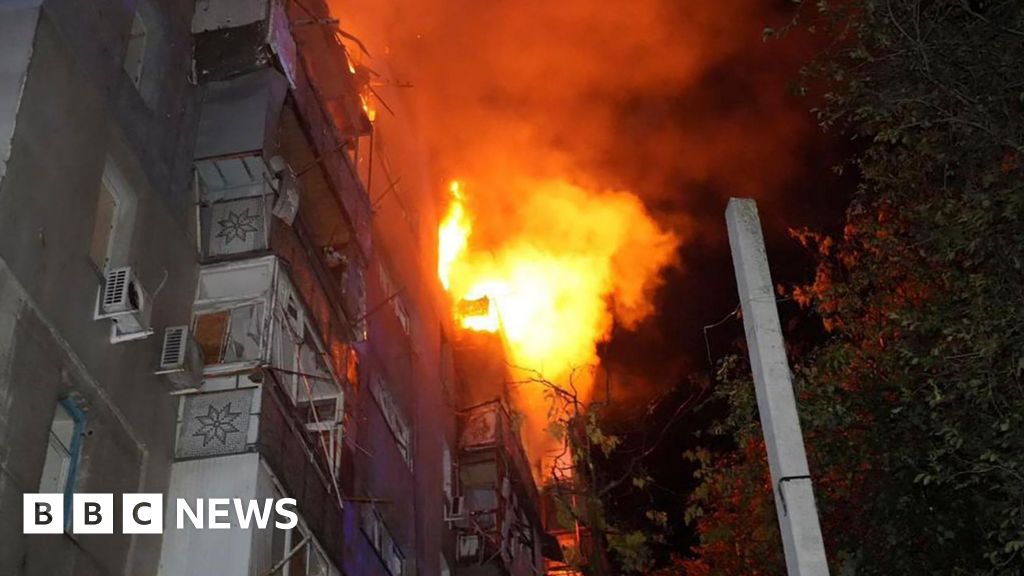 Ukraine war: Buildings burn after renewed Russian air attacks