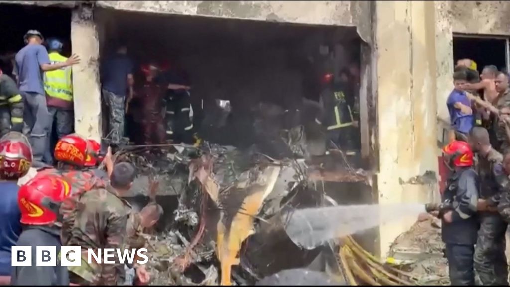 Bangladesh plane crash: 'I heard an explosion, saw fire'