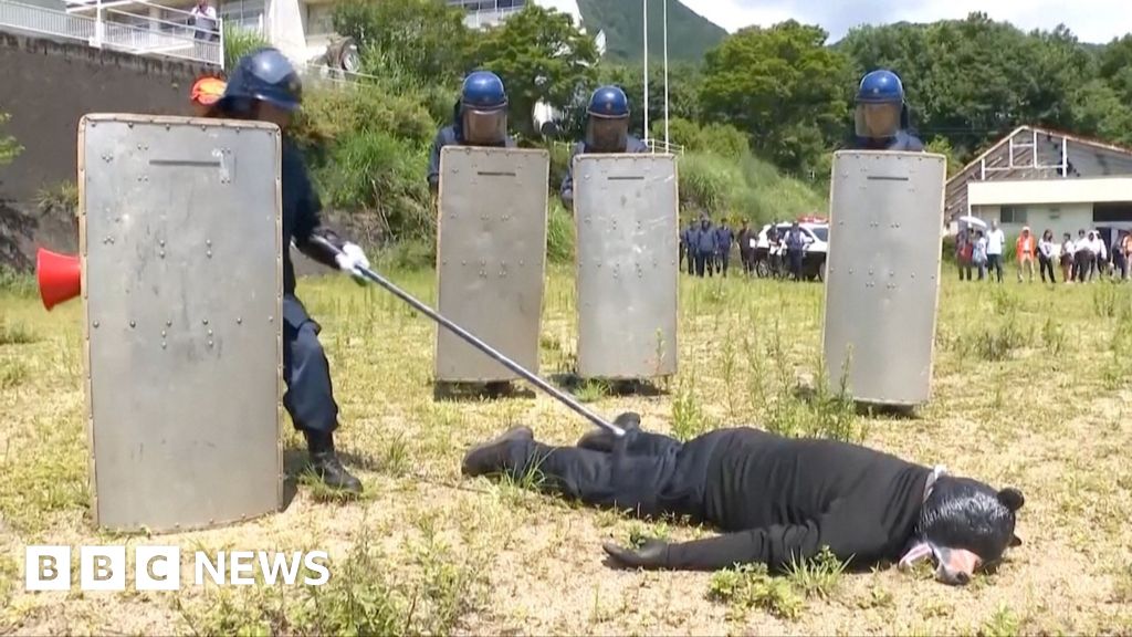 Watch: Man dons bear costume in Japanese Police animal attack drill