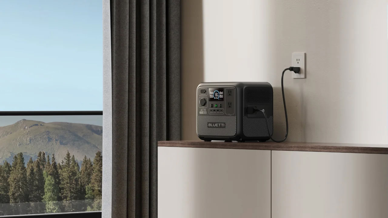 BLUETTI AC70 Portable Power Station next to window