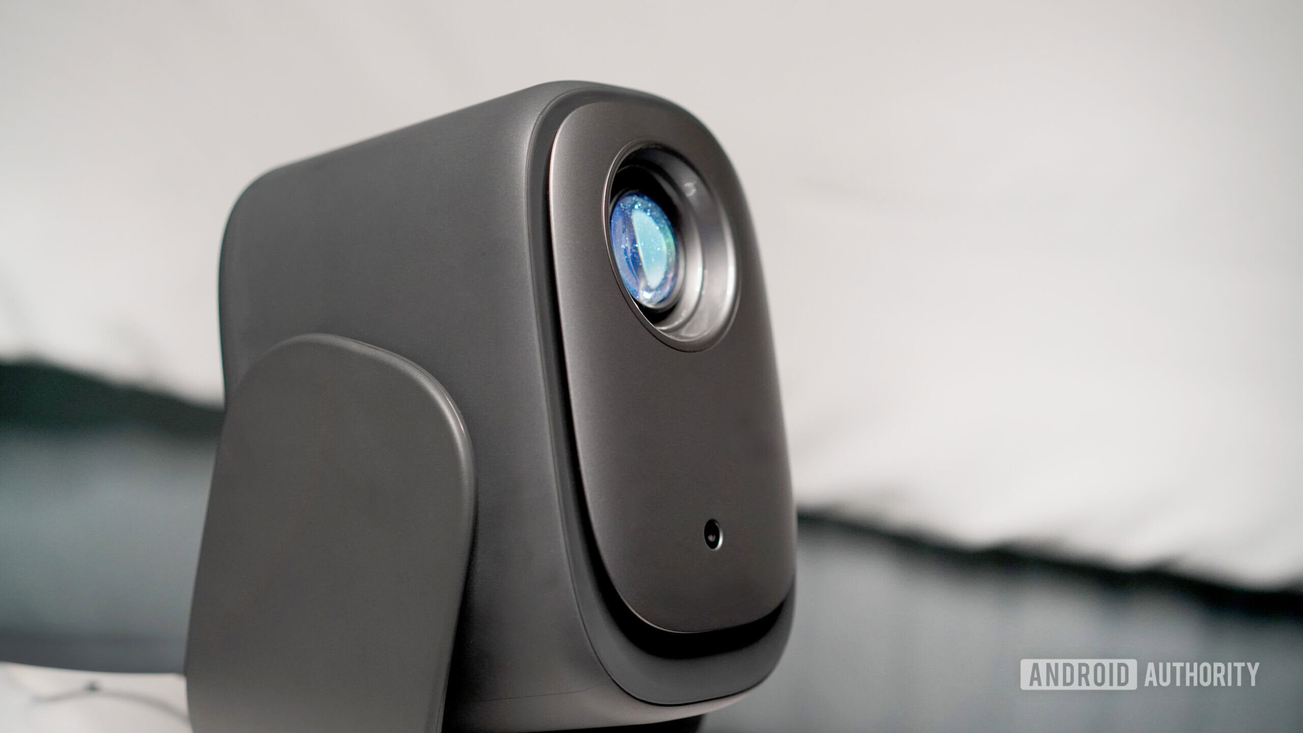 This $179 portable projector has a 190-degree gimbal that has turned my ceiling into a cinema screen