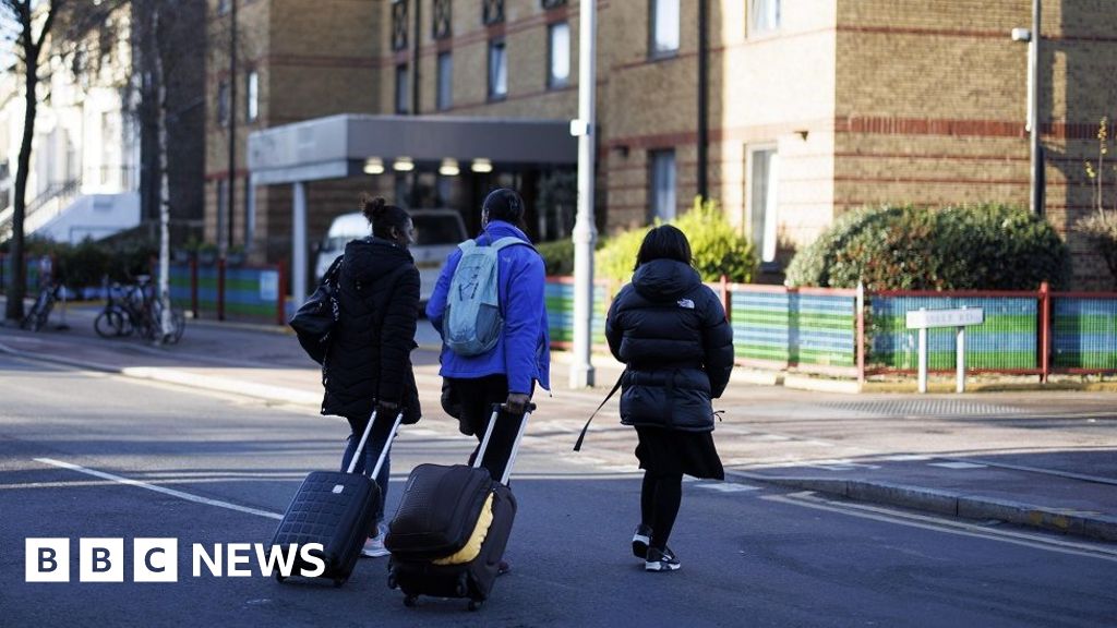 UK's asylum hotel bill down 30%, government says