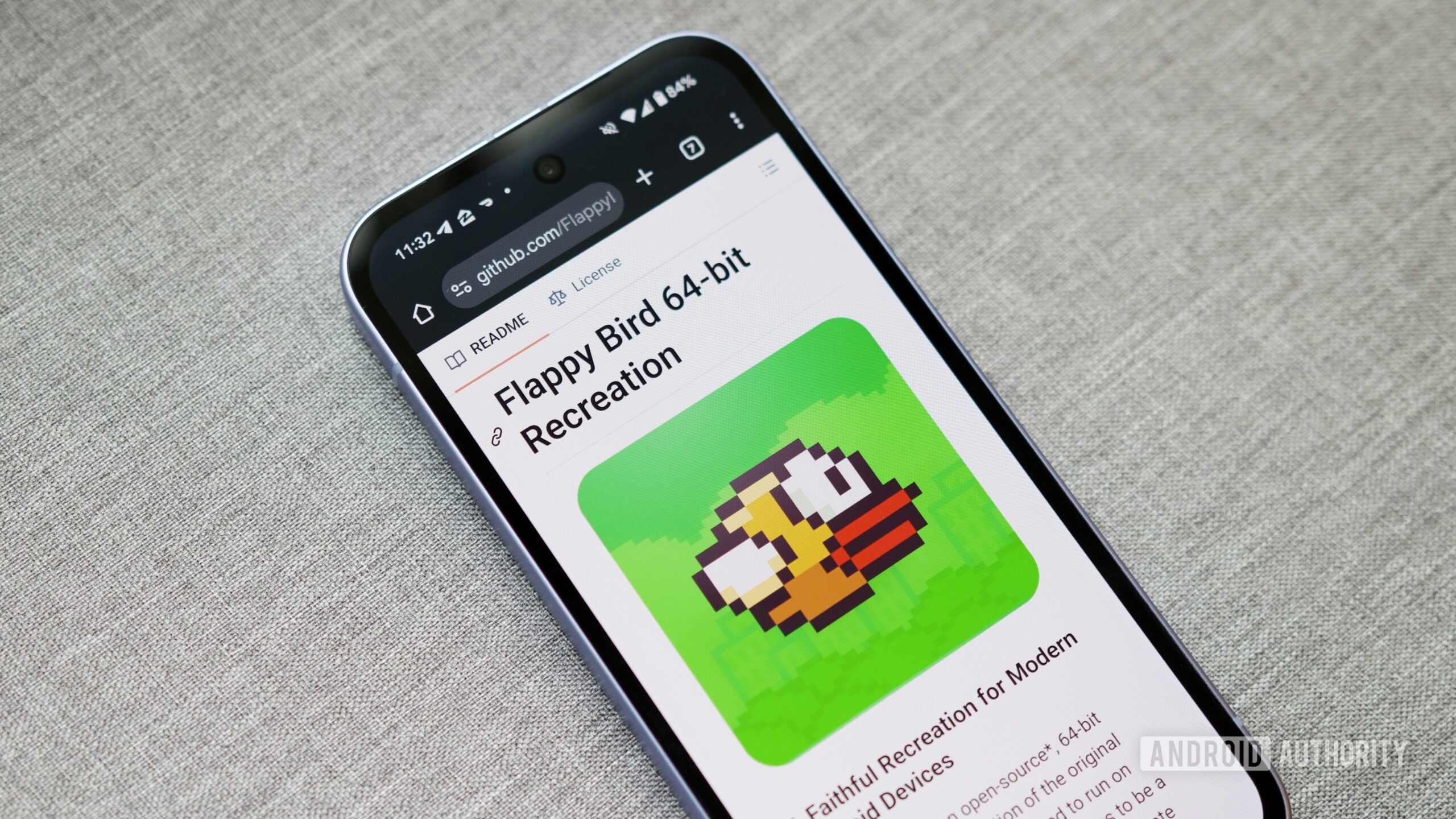 The GitHub page for the 64-bit Flappy Bird recreation, displayed on an Android phone.