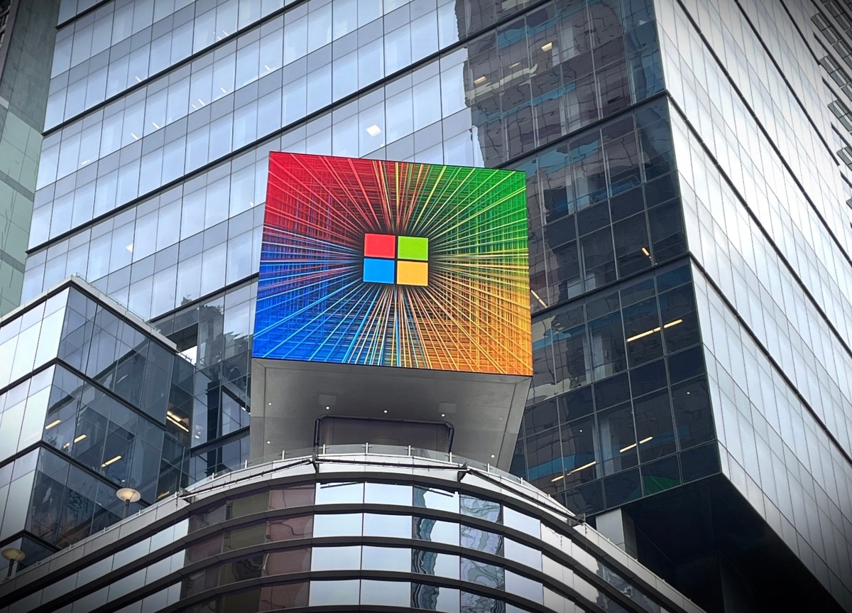 A Microsoft store entrance with the company's logo on top in midtown Manhattan