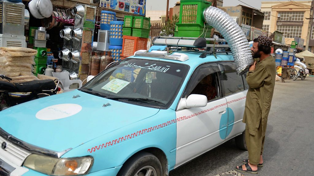 Afghan cabbies' DIY solution to keep cool
